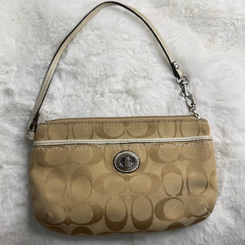 COACH Tan Signature Canvas Turnlock Wristlet